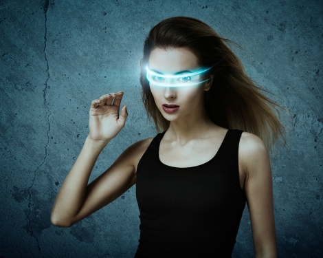 Woman wearing futuristic VR headset